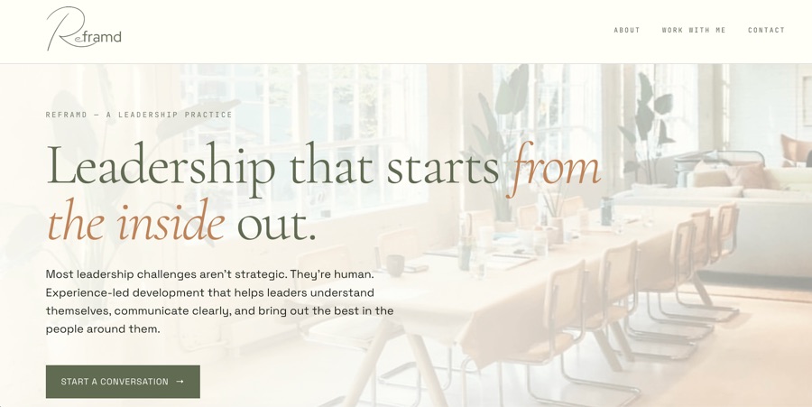 Reframd website with olive typography and a meeting-room photograph